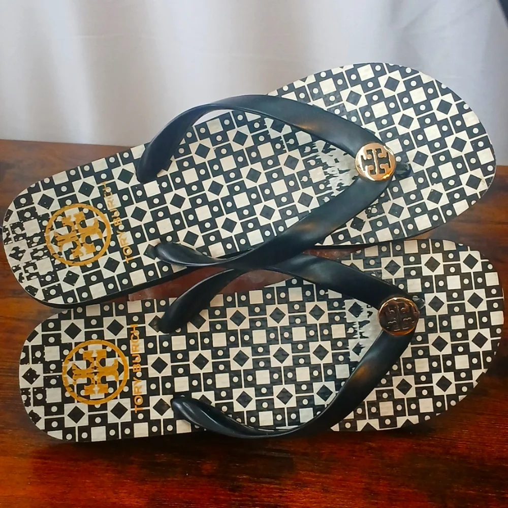 Tory Burch Black and White Logo Flip Flop Sandals with Gold Emblem